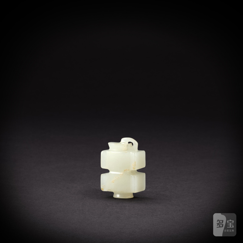 A white jade 'sinan' pendant, Han dynasty | 漢  白玉思南形珮